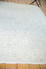 Distressed vintage Turkish Sivas rug, showing subtle ivory and oxidized silver floral motifs.