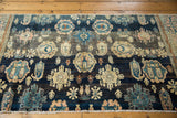 Antique Persian Farahan Sarouk rug detail: large palmettes, botehs, navy, antique ivory, and sky blue teal.