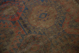Antique Belouch carpet texture, revealing mostly even wear and muted analogous colors.