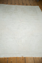 Reverse side of vintage Oushak rug showing natural foundation weave and painted numbers.