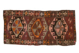 Vintage Oushak mat runner with asymmetric geometric design in aubergine, blush, and tangerine.