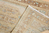 Distressed vintage Oushak rug pile texture with even wear, original selvage, and visible hand-knotted back.