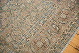 Herati motif and Samovar border detail on vintage Persian Tabriz in muted green, sand.