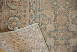 Vintage Tabriz rug corner reveals Herati motif, knot-head wear, and woven foundation.