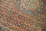 Distressed vintage Bijar rug showing muted brick red, blue Herati motifs and low pile.