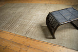 Textured antique distressed Malayer runner with neutral Mir boteh design and soft patina.