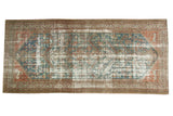 Distressed vintage Malayer runner rug, denim blue and brick red tree of life with leopard motifs.
