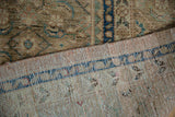 Distressed hand-knotted Mahal carpet pile with visible knot heads and structural blue reverse.