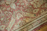 Worn raspberry red and sea foam green distressed Mahal carpet with palmette motifs.
