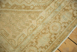 Distressed Afshar carpet pile, showing worn texture, muted sand, coffee brown, and sea foam designs.