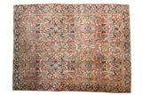Vintage Persian Heriz carpet, allover expressive floral design in brick red, navy, oxidized green.