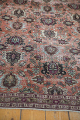 Distressed vintage Veramin carpet showing its lower multi-band border and worn copper field.