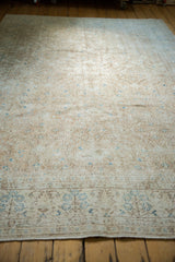 Distressed Sparta carpet displaying even wear, faint foundation, and muted blue motifs.