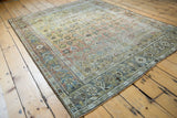 Distressed vintage Afshar rug showing allover floral geometric patterns with knot head wear.