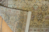 Hand-knotted construction and securely taped edge of the distressed vintage Afshar rug.