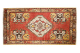Vintage Oushak rug mat, cherry red field, ivory stepped medallion and corner planter designs.