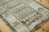 Dynamic texture, low pile, and foundation etching on a distressed Oushak rug.