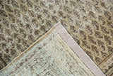 Distressed vintage Mir Serbend carpet, faded boteh design and visible hand knotted foundation.