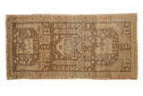 Distressed Sivas runner, pictorial village life and animal motifs in bronze and ivory.