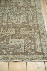 Distressed vintage Sivas runner showing worn knot heads, faint foundation, and pictorial motifs.