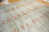 Fine distressed texture of intricate terracotta motifs on a vintage Sivas carpet.