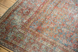 Distressed texture and sky blue, blush red Herati pattern on vintage Persian Mahal rug.