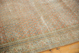 Distressed vintage Mir Serbend rug, Mir boteh design, traditional border, and faded terra cotta, ivory tones.