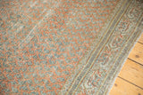 Distressed vintage Mir Serbend carpet showing its faded boteh motif and vinery border design.