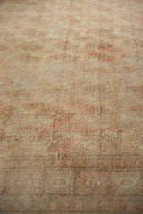 Faded elephant footprint guls on distressed vintage Bokhara carpet in pale blush.