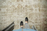 Vintage Distressed Mahal carpet texture showing exposed foundation and subtle floral patterns.