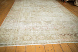 Full display of the distressed vintage Mahal rug with exposed foundation and subtle floral design.