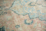 Even wear on vintage distressed Khorassan carpet pile with apricot, sky blue, and beige vines.