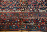 Vintage Shiraz rug borders with intricate geometric, floral patterns in navy, brick red, ivory.