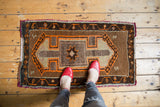 Thick pile corner of vintage Oushak rug with tangerine and brown pearl and vine border.