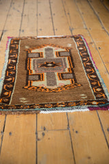 Thick pile, white fringe, and chocolate brown geometric border on this vintage Oushak rug.