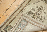 Hand-knotted Oushak rug revealing sturdy foundation, distressed pile texture, and intact selvage.