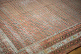 Distressed vintage Mir Serbend rug corner, with repeating boteh field and multi-banded border.