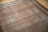 Distressed Mir Serbend carpet section with madder red boteh motif, slate blue, and exposed foundation.