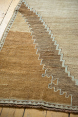 Detailed stepped border with powder blue outlines and natural abrash on this vintage Oushak rug.