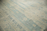 Detail of Samarkand Khotan style carpet's even low pile with pale blue and ivory patterns.