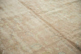 Distressed Sparta carpet showing mostly even wear to knot heads and visible foundation.