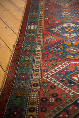 Intact original selvage and multiple geometric borders of a vintage Persian Karaja rug runner.