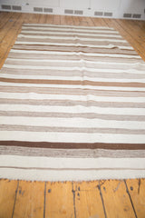 Vintage Moroccan Kilim runner, varied horizontal stripes in natural brown, ivory, beige.