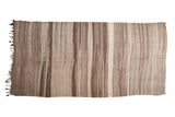 Vintage Moroccan Kilim runner with natural brown, beige, and ivory striations and abrashes.