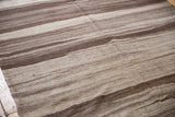 Close-up of vintage Moroccan Kilim showing natural horizontal striations and abrash.