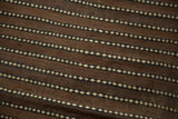 Geometric ivory dashed pattern on the hand woven Moroccan Kilim runner.