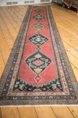 Karabagh runner end with green borders, dark blue serrated pattern, and soft pile.
