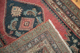 Secured edge, fringe, and hand-knotted pile of a vintage Karabagh rug.