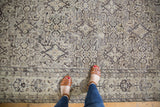 The low pile and mostly even wear on an intricate Herati pattern vintage Hamadan rug.