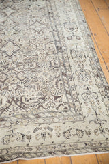 Close view of the vintage Hamadan rug's mostly even wear with faint foundation showing through.